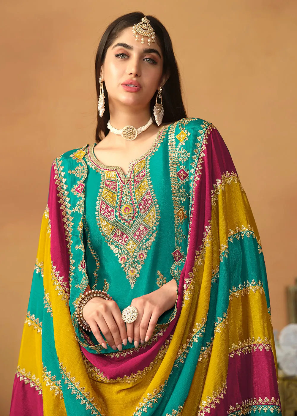 Chinnon Silk Turquoise Salwar Suit with Multicolor Dupatta