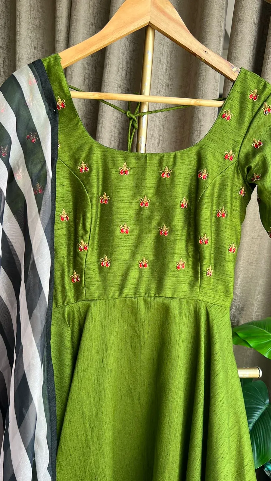 Green silk salwar suit of hand worked top and Duppata